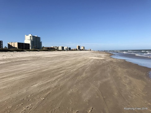 Sand blowing over the beach