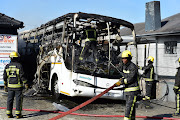 The Eagle Liner/Intercity Xpress bus was allegedly set alight by an aggrieved passenger.