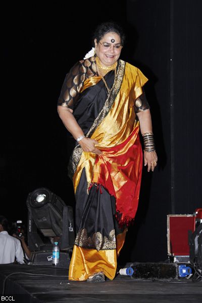 Usha Uthup arrives on stage during 'Kala Ghoda' Festival, held in Mumbai on February 3, 2013. (Pic: Viral Bhayani)