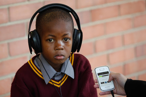 Senzokuhle Khumalo, six, of Laerskool Generaal Nicolaas Smit in Pretoria, has his hearing tested using hearScreen.