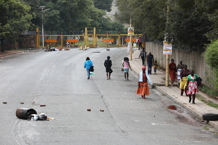 Patients at Charlotte Maxeke Academic Hospital in Johannesburg turn back as Nehawu members protest for salary increases.