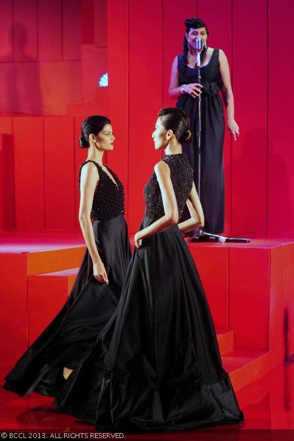 Models walk the ramp for fashion designer Ashish N Soni during the grand finale of the Wills Lifestyle India Fashion Week (WIFW) Spring/Summer 2014, held in Delhi.