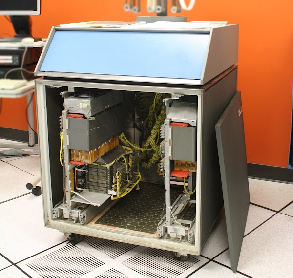 A view inside the IBM 1406 Storage Unit, which provides 12,000 characters of storage for the IBM 1401 mainframe. At the left is the 8,000 character core module below the cards that control it.