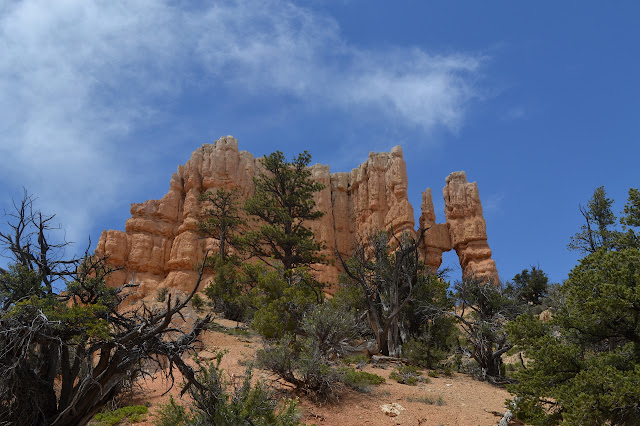 block of rock with an opening at the right