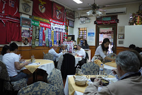 people eating at O Santos in Macau