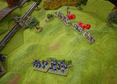 The Confederate hold on the hill weakens