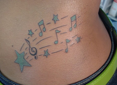 Tattoo Musical Design on Hip