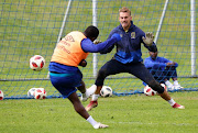 Peter Leeuwenburgh of Cape Town City fasces a shot from Ayanda Patosi of Cape Town City during the Cape Town City FC Media Open Day at Hartleyvale, Cape Town on 1 August 2018. 
