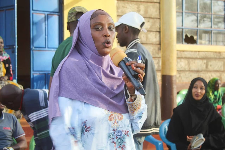Marsabit governor's wife Alamitu Guyo when she distributed equipment to women and youth groups in the county on Monday, August 1.