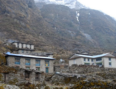 Lama Shakya's house with the yellow Lama's Om Lodge sign we made back in 2001