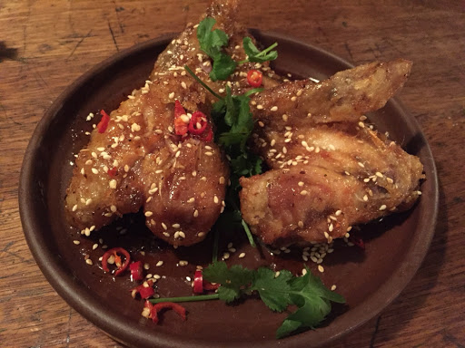 Delicious sticky chicken wings in fish sauce