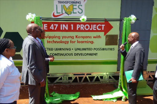 Safaricom Foundation chairman Joseph Ogutu speaks during the launch of the first eBoks at Ndundu Primary school.