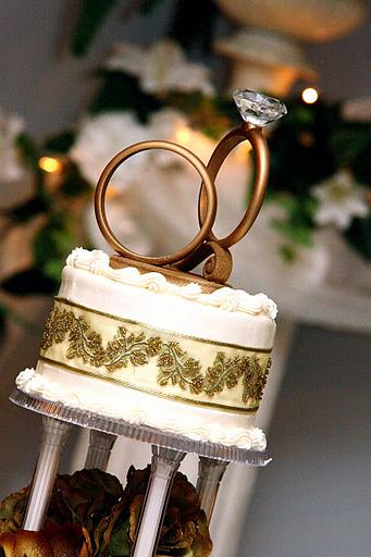 The wedding cake, carefully