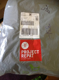 Project Repat upcycled t-shirt quilt arrives!