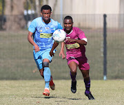 Dellmico Malgas of Upington City, left, and Gift Nemutandani during their ABC Motsepe national play-off semifinal clash at Harry Gwala Stadium Pietermaritzburg on Friday.