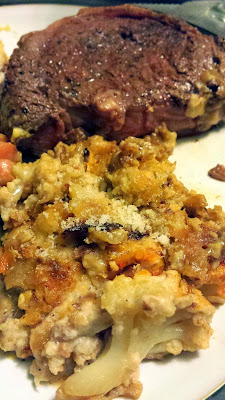 New Year's Eve Dinner with butternut squash fettuccine, part of a Joseph Creek Cattle Company rib-eye, a vegetarian fricassee, and cauliflower gratin with manchego almond sauce