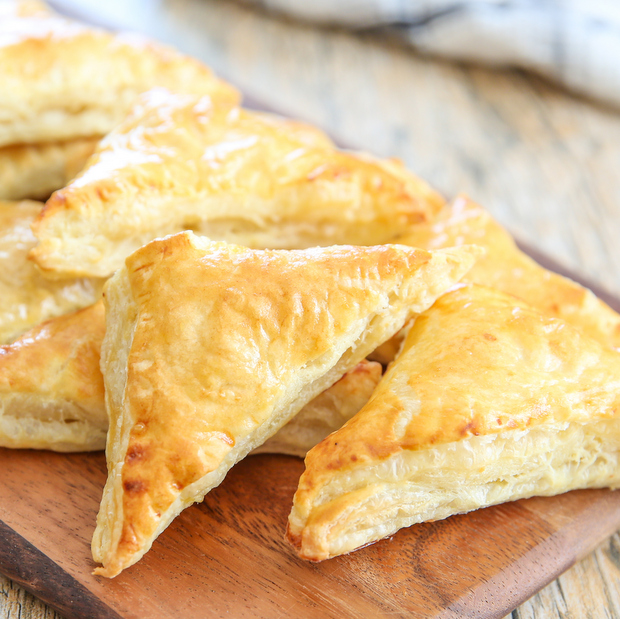 mashed potato pastries on a cutting board