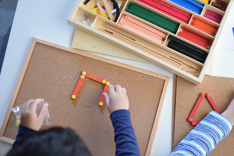 Using Montessori Geometric Sticks to form shapes