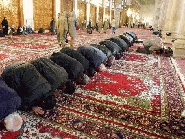 Muslims praying