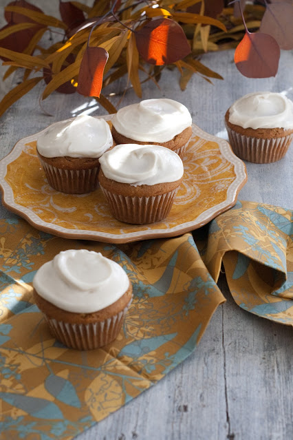 GF pumpkin cupcakes with maple icing