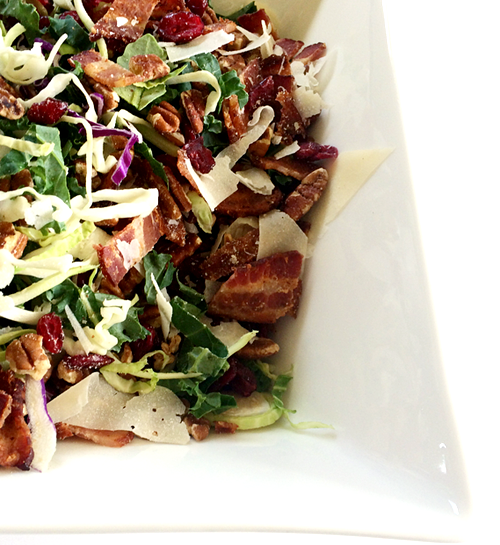 brussels sprout salad with bacon, cranberries, pecans, + fresh parm w/pear vinaigrette