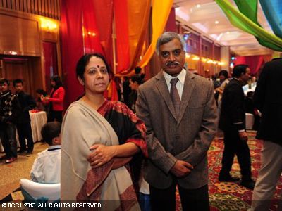 Satyendra Garg, joint commissioner of police (Traffic)with wife during the Times of India Social Impact Awards, held in Delhi. 