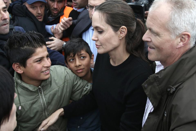 UNHCR goodwill ambassador and US actress Angelina Jolie visits the Greek port of Piraeus where thousands of refugees and migrants are stranded on 16 March 2016 Panagiotis Tzamaros / AFP Photo