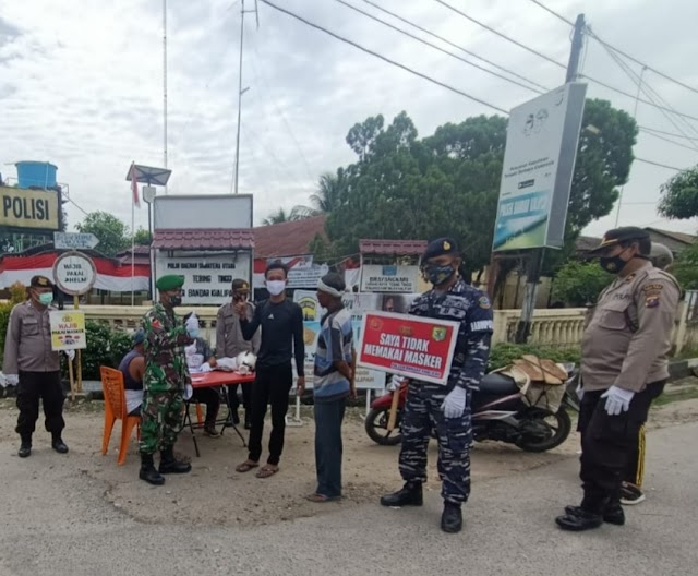 Polsek Bandar Khalifah Terus Sampaikan Disiplin Prokes