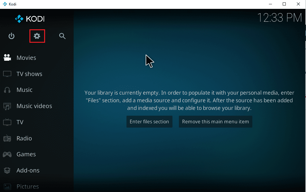 Seleziona Impostazioni icona a forma di ingranaggio nel menu principale di Kodi.  Come aggiungere musica a Kodi