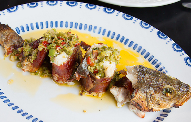 Roasted Branzino, Lemon Herb Stuffing, Olives & Chili Tapenade, & Serrano Ham