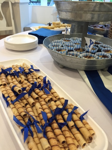 Graduation cookies tied with blue ribbon Graduation cookies BYU graduation party blue and white