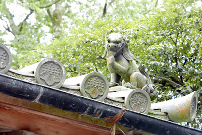 The Guardian Lions on the gate roofs of Kinkakuji (Golden Pavilion) in Kyoto have a variety of great poses that are a bit humorous