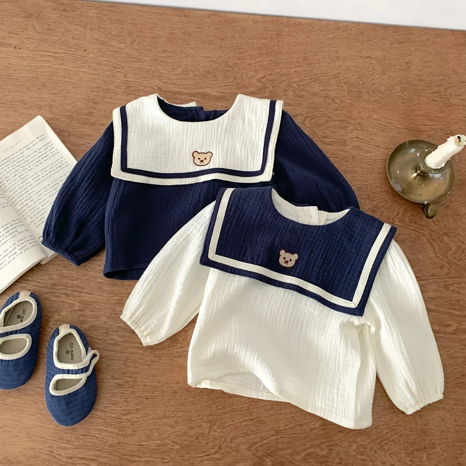 Conjunto de manga larga estilo academia para bebé con top de cuello marino Ideal para comodidad y elegancia en cada ocasión.