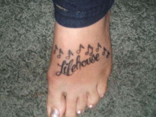 Tattoos Of Music Notes. music notes tattoos on feet