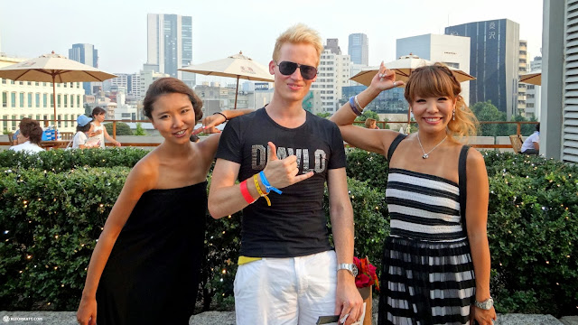 taking a photo after receiving a free hair restyle at the Island Festival in Shibuya in Shibuya, Japan 