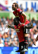 Romelu Lukaku  celebrates after scoring for Manchester United.