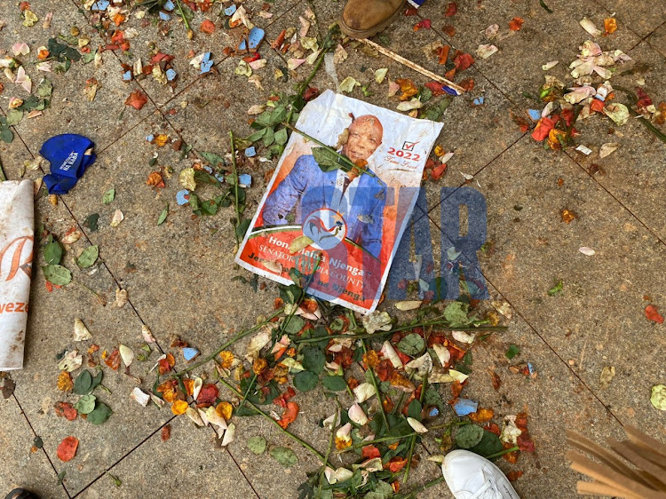 A poster of Maina Njenga seen outside Kasarani Stadium in the mis=dst of the chaos.