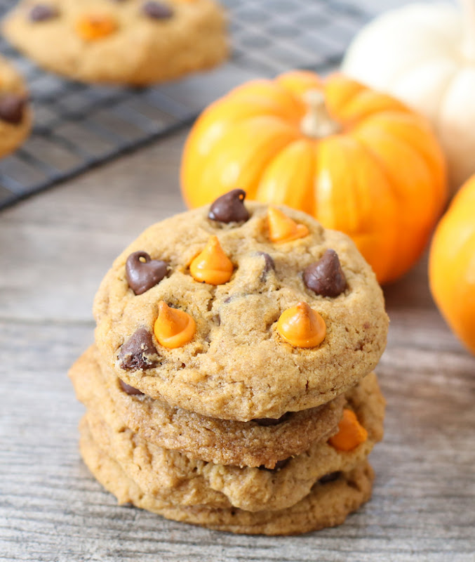 close-up photo of a stack of chewy pumpkin chocolate chip cookies