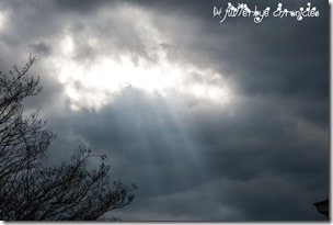 sun peaking through clouds