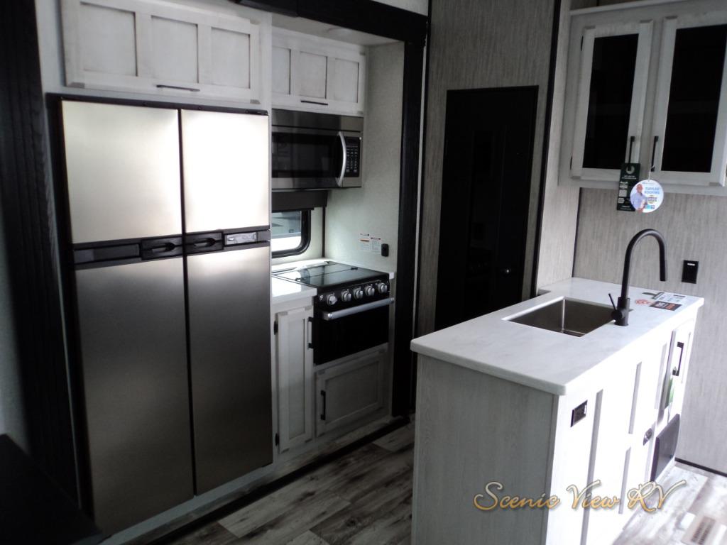 The stainless steel appliances in this unit make it easy to clean.