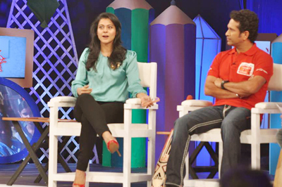 Kajol with Sachin Tendulkar during 'Support My School' Telethon '13, held in Mumbai on February 3, 2013. (Pic: Viral Bhayani)