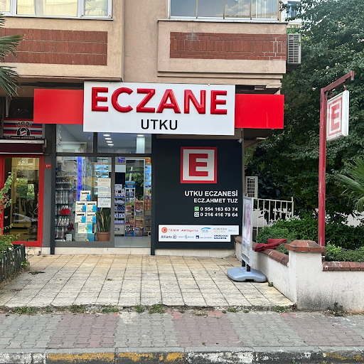 Utku Eczanesi logo