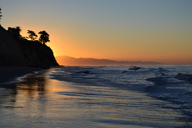 waves hitting light as they start to break