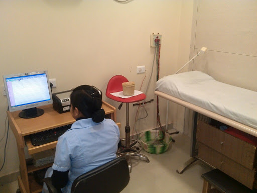 Suraksha Diagnostic - Jalpaiguri, 1st Floor, Cosmos Arcade, DBC Road, Municipality Ward No. 4, Jalpaiguri, West Bengal 735101, India, Medical_Imaging_Centre, state WB