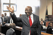 Julius Malema speaks to the crowd after appearing in court on charges of money laundering Picture: JAMES OATWAY