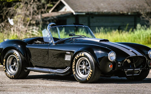 Classic Black Sports Car Showcases Timeless screenshot 2