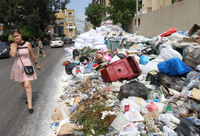 A river of white-bagged garbage winds through Beirut, Lebanon. Photo: Joseph Eid / AFP / Getty Images