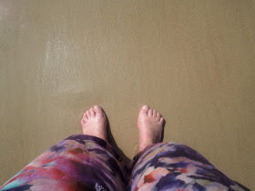 My feet on the sand at the beach 