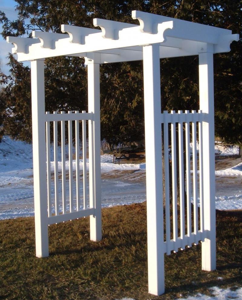 This white wooden arbor is