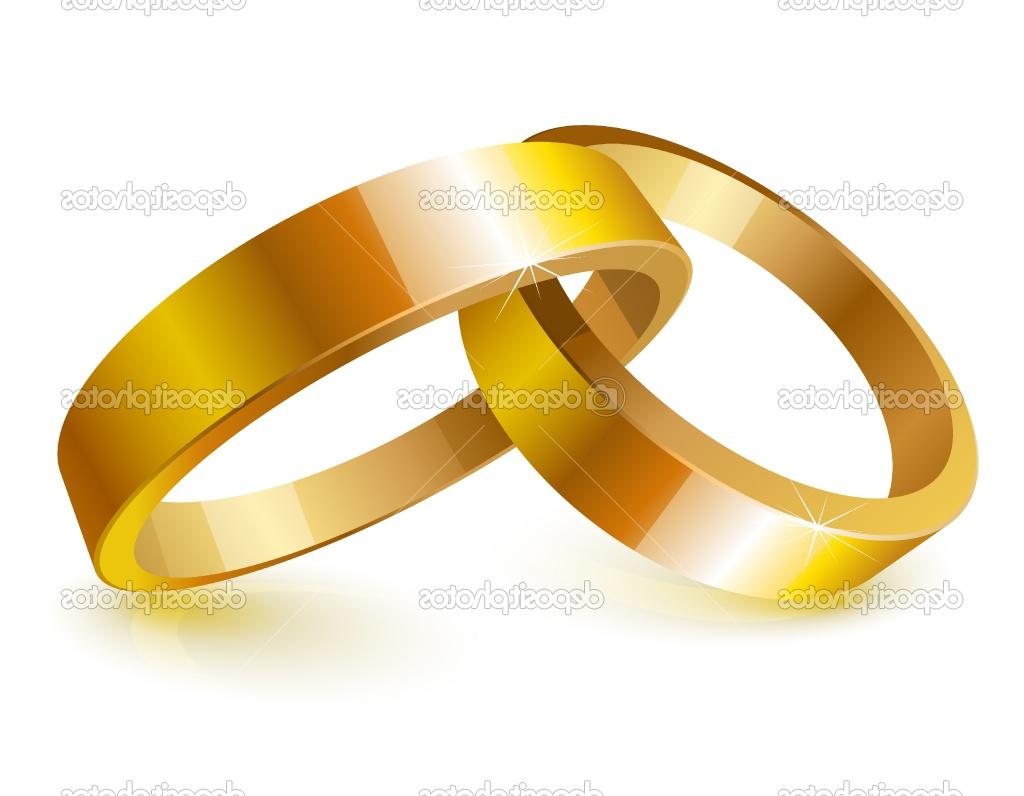 Gold wedding rings over white